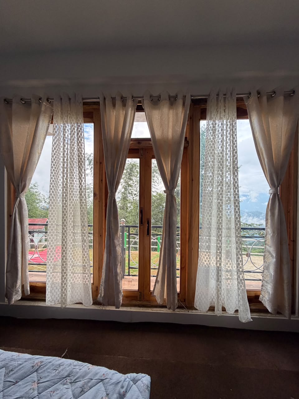 Valley and forest view through the room windows at Kepchaki Stay